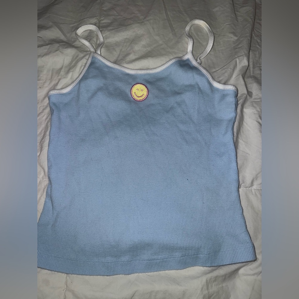 Lazy Oaf baby blue with white trim with yellow and pink trimmed smile tank top